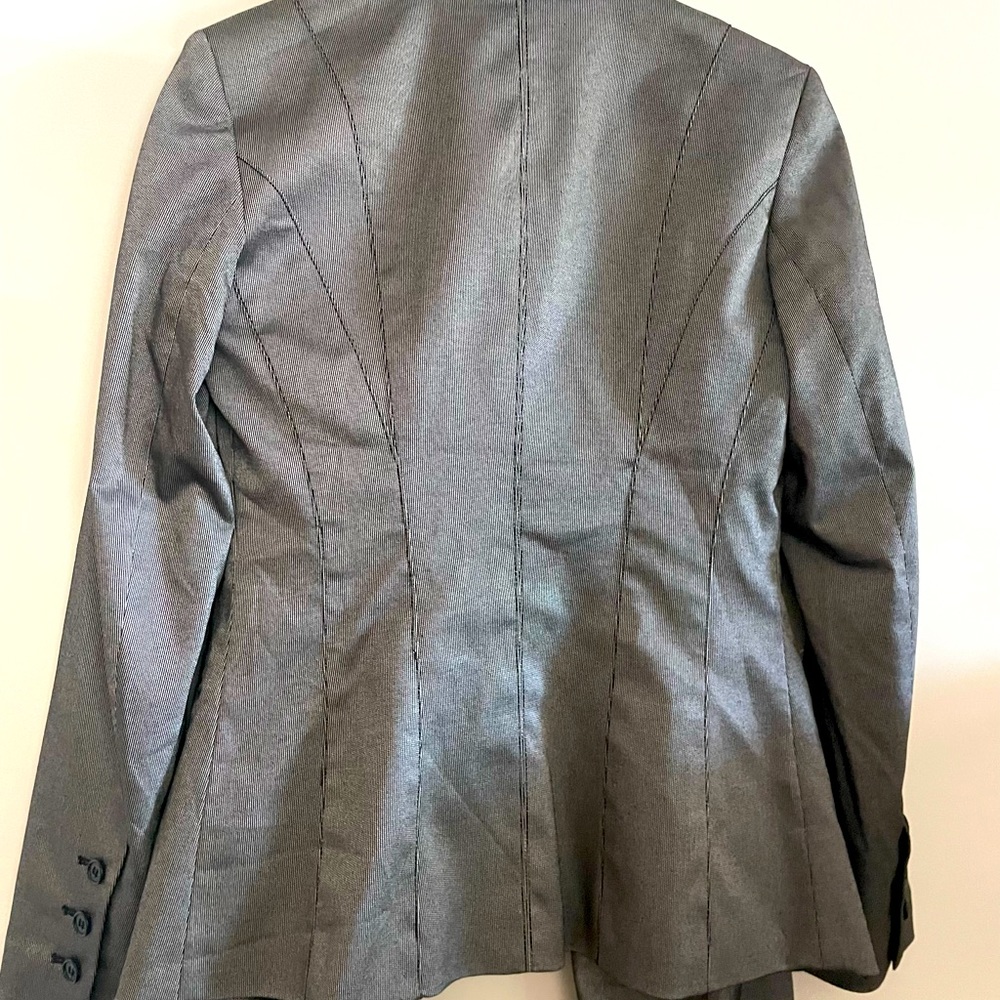 Bebe pant suit.  Beautiful grey with a sheen.  Blazer size 2.  Pants size 4.